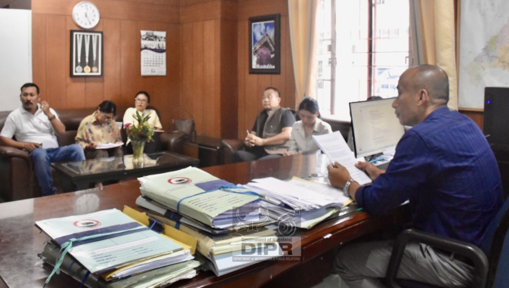 ADC Ruopfukuotuo Noudi along with other officials during the review meeting held at the ADC’s Office Chamber in Kohima on July 22. (DIPR Photo)